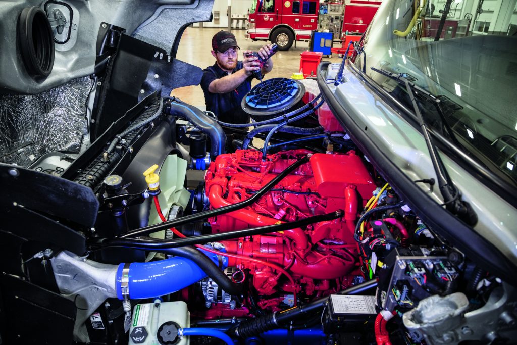 technician-working-on-truck