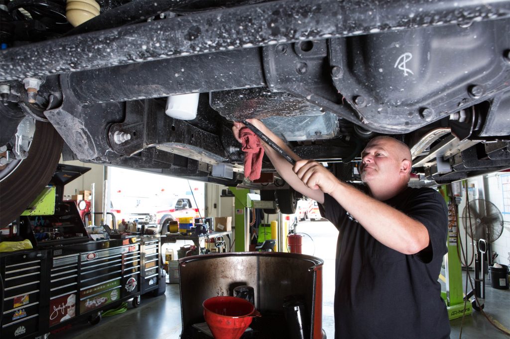 mechanic-under-truck-campbell-supply-service